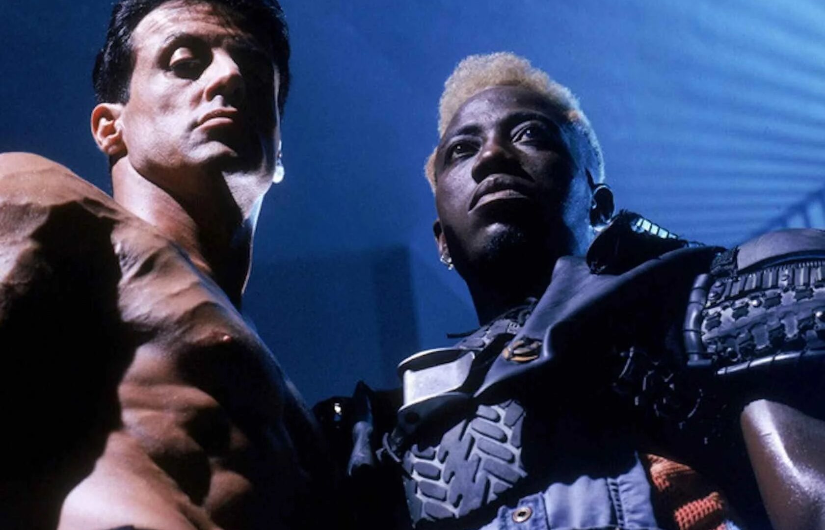 Sylvester Stallone and Wesley Snipes in a film still from Demolition Man.