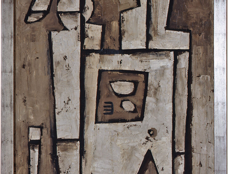 Two Figures with Still Life, Gonzalo Fonseca, 49 1/8 x 35 inches, oil on burlap. A vertical, rectangular painting representing two, geometric, abstract figures. The boxy figures take up most of the painting which is rendered in tones of gray with black outlining. The figure at left has a circle for a head with a small crescent shape positioned just to its left. Squared off shoulders lead into a rectangular body that disappears behind another tall rectangle in front of it. A thin, upright rectangle is positioned separately near the bottom left. At right, another figure has a boxy head and uneven square shoulders with a slim bit of straight body visible behind the rectangle in front of it. That rectangle has a triangular chunk taken out of its lower portion, perhaps suggesting a table leg. A dark gray, slanted square is positioned in its upper portion and contains three small abstract shapes. The figures and the table representation are a pale gray with visible brushwork while the background is rendered in deeper gray.