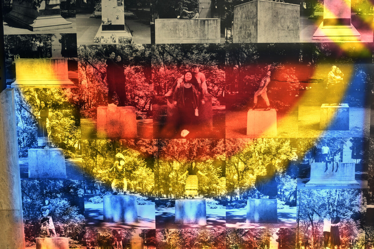 A wall of black and white portraits overlaid with a red, yellow, and blue half circle of lights