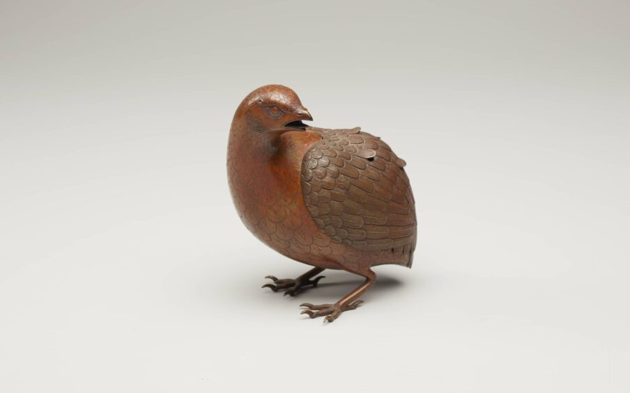 Brass incense burner in the shape of a quail.
