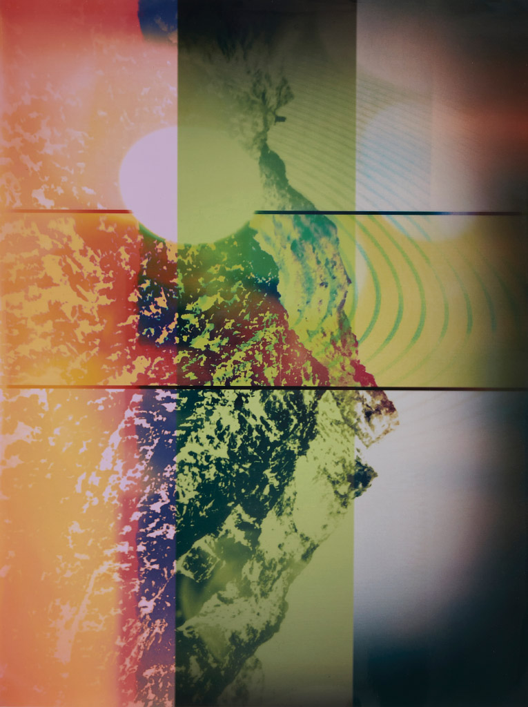 Photo of a sideways mountain with layers of transparent patterns and colors over it