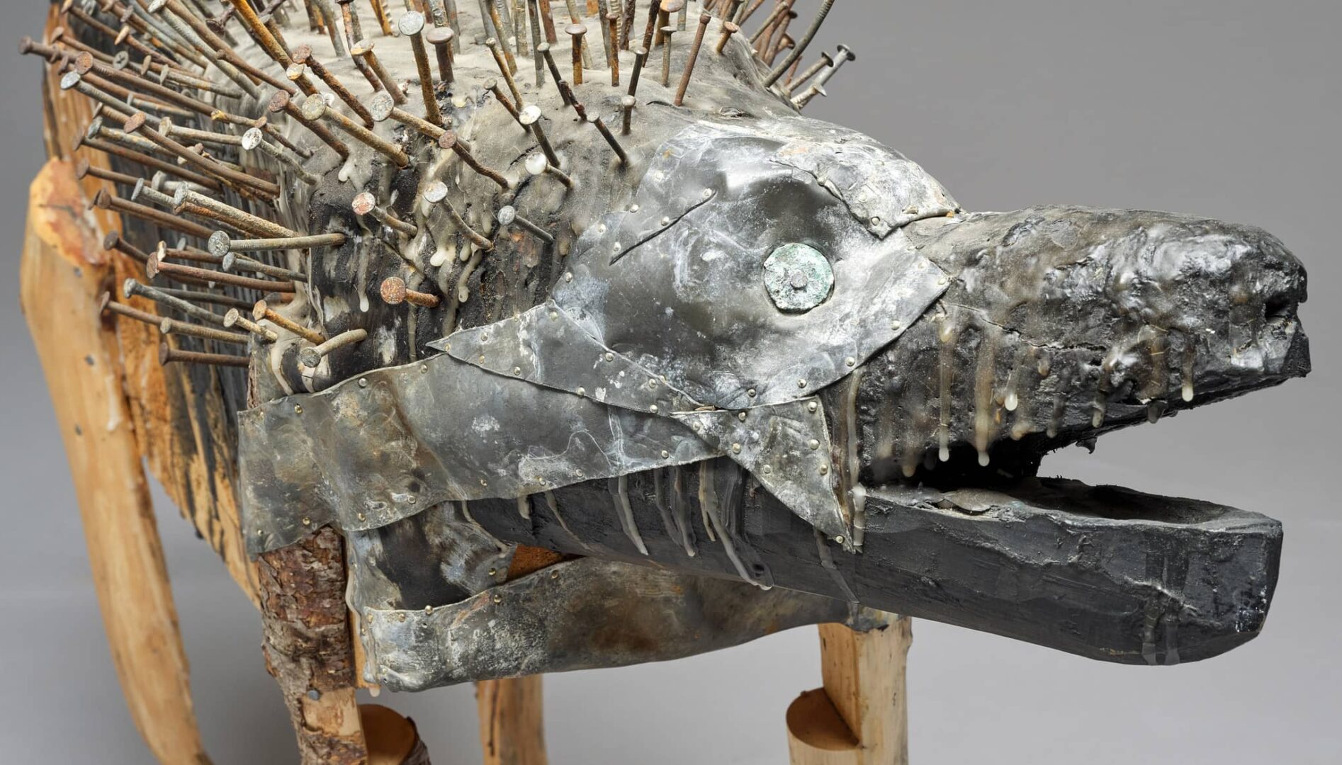 Mixed media sculpture of a dog.