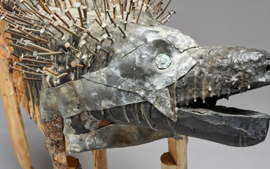 Mixed media sculpture of a dog.