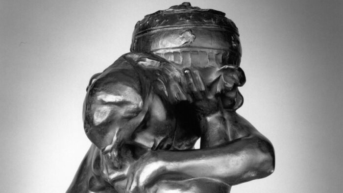 Sculpture of a person holding an urn