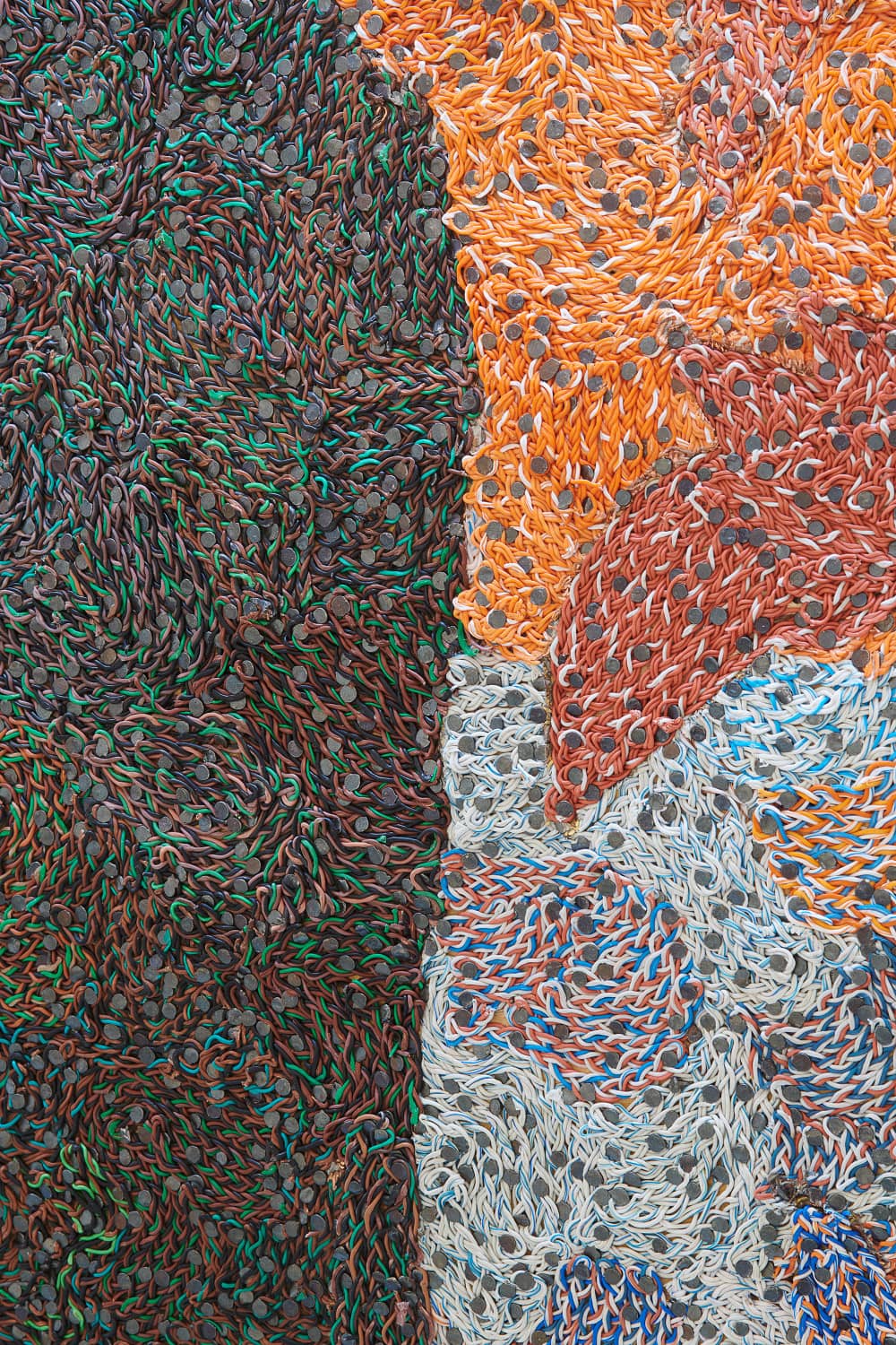 Extreme closeup displaying various materials used in a sculpture.